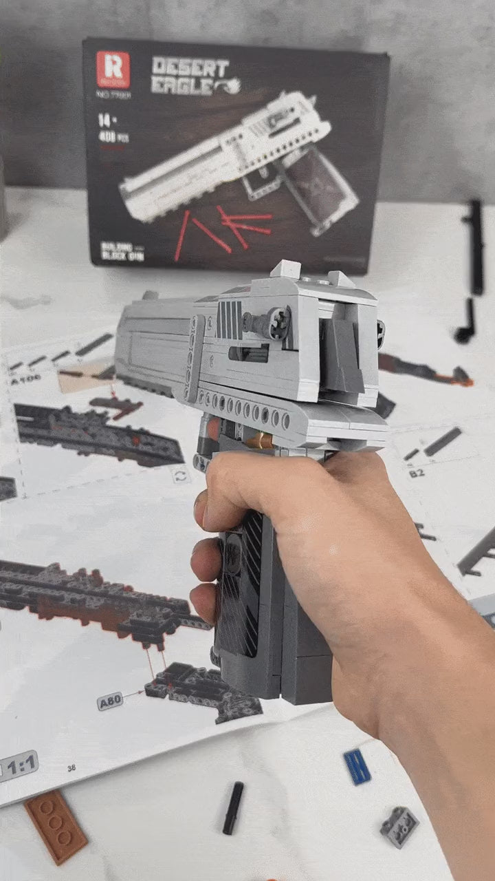 Silver Large-Frame Pistol — turn-around clip